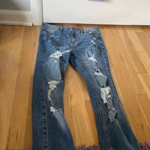 High-waisted ripped jeans